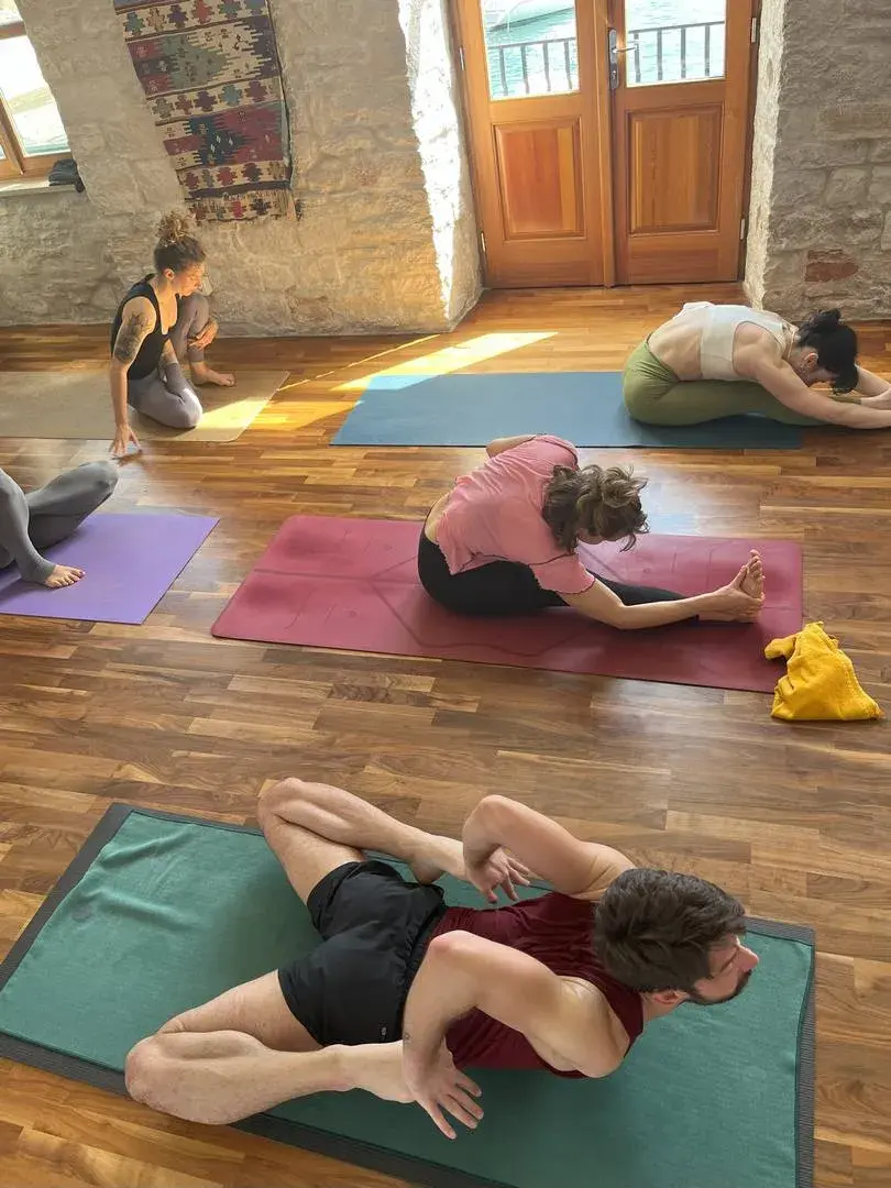 Stone terrace yoga with sea views